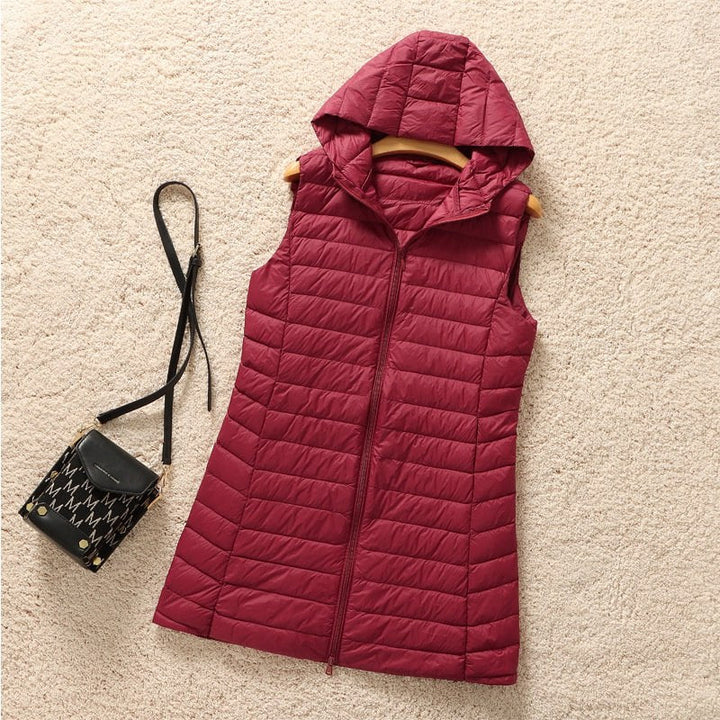 Naadmaastricht | Warme en modieuze gewatteerde jas met capuchon – AYA